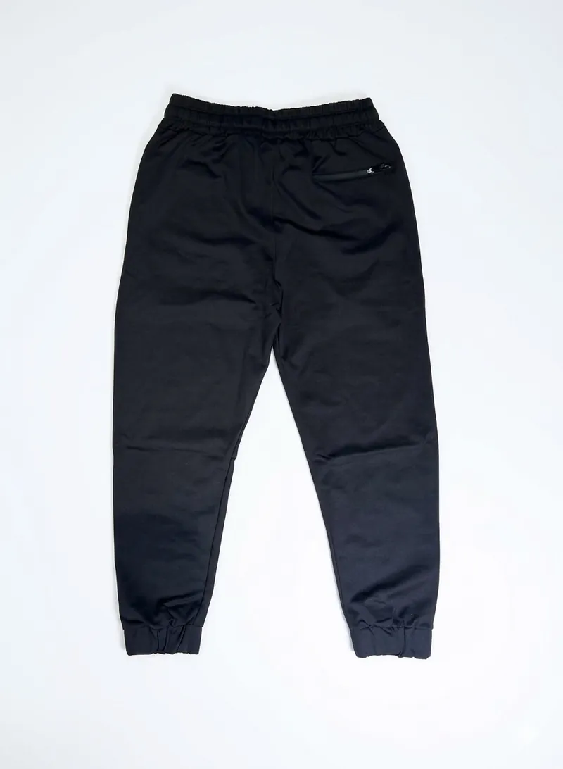 Jogger negro hombre vista lateral – The Heavy Unit