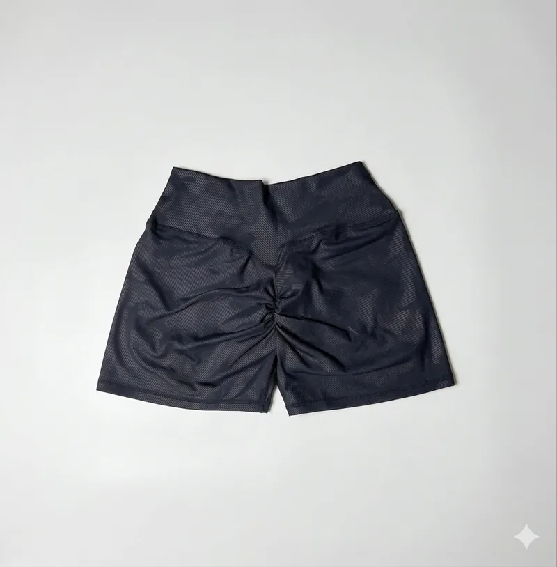 Short negro mujer vista lateral – The Heavy Unit