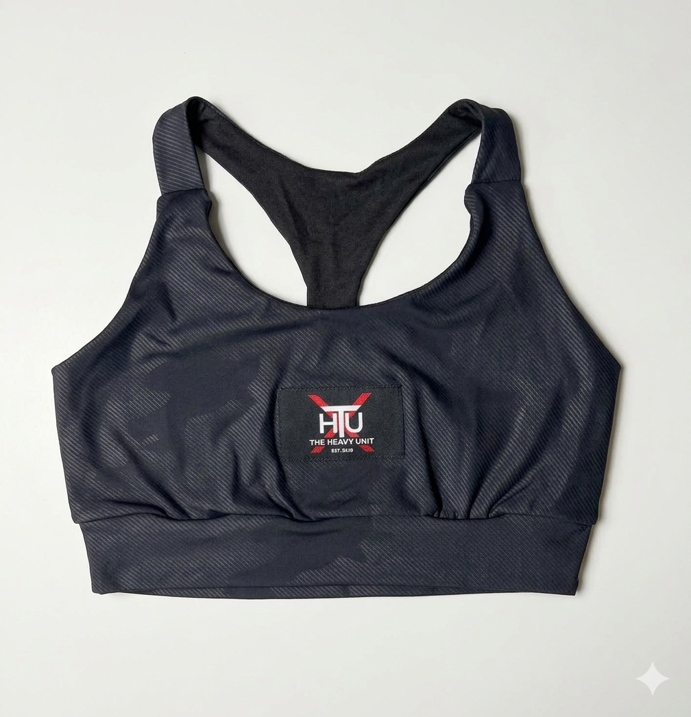 Top deportivo negro mujer vista lateral – The Heavy Unit