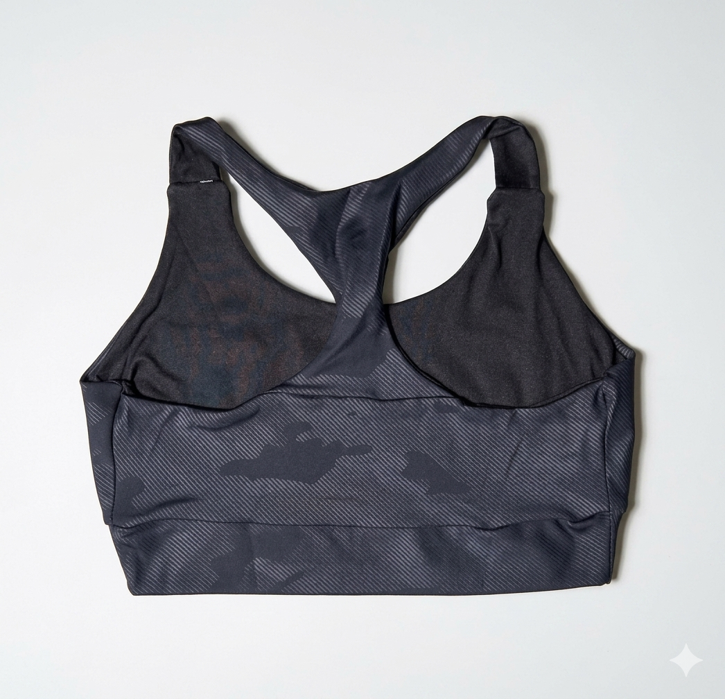 Top deportivo negro mujer vista trasera – The Heavy Unit